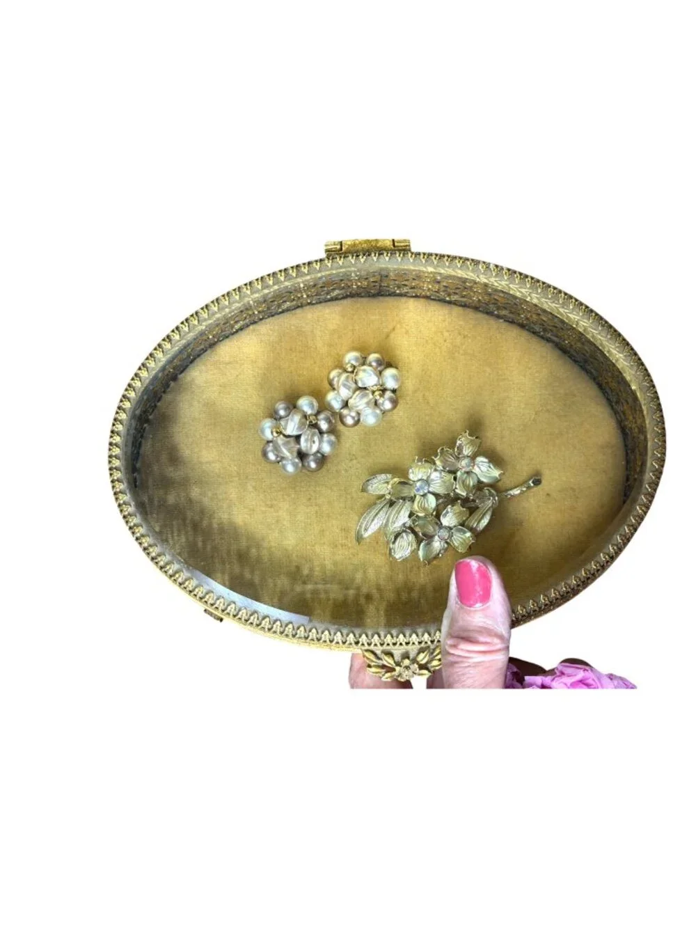 Vintage Hollywood Regency style brass filigree jewelry box with beveled glass to